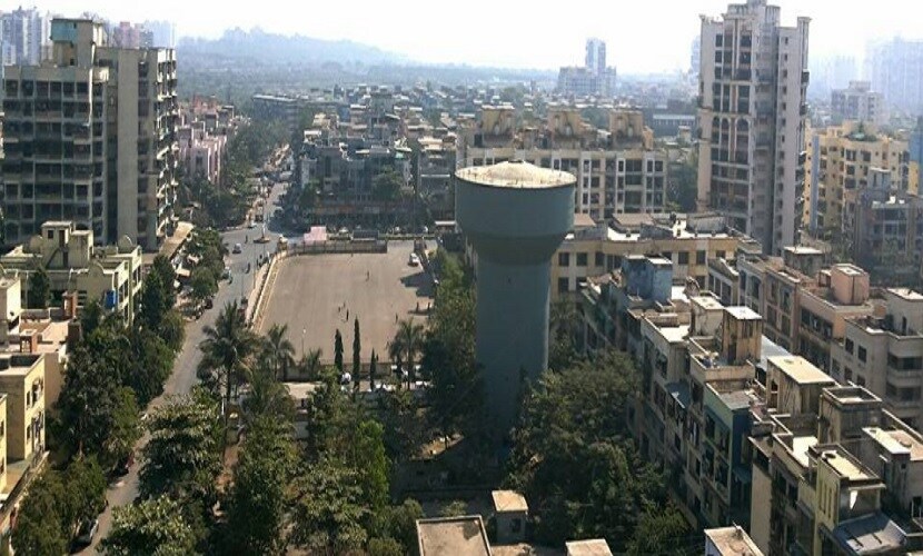 Seawoods Sector 44_"a large building with a clock on its side"